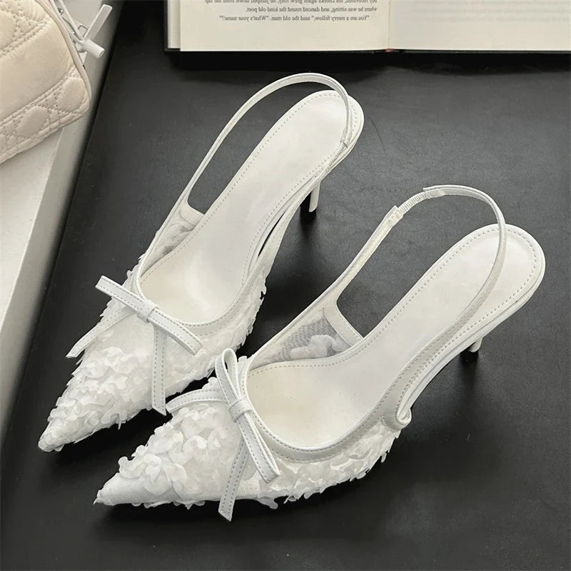 Butterfly-knot Pointed Toe Pumps
